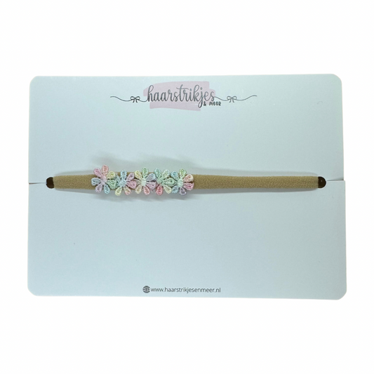 Haarbandje - Pastel regenboog bloemetjes
